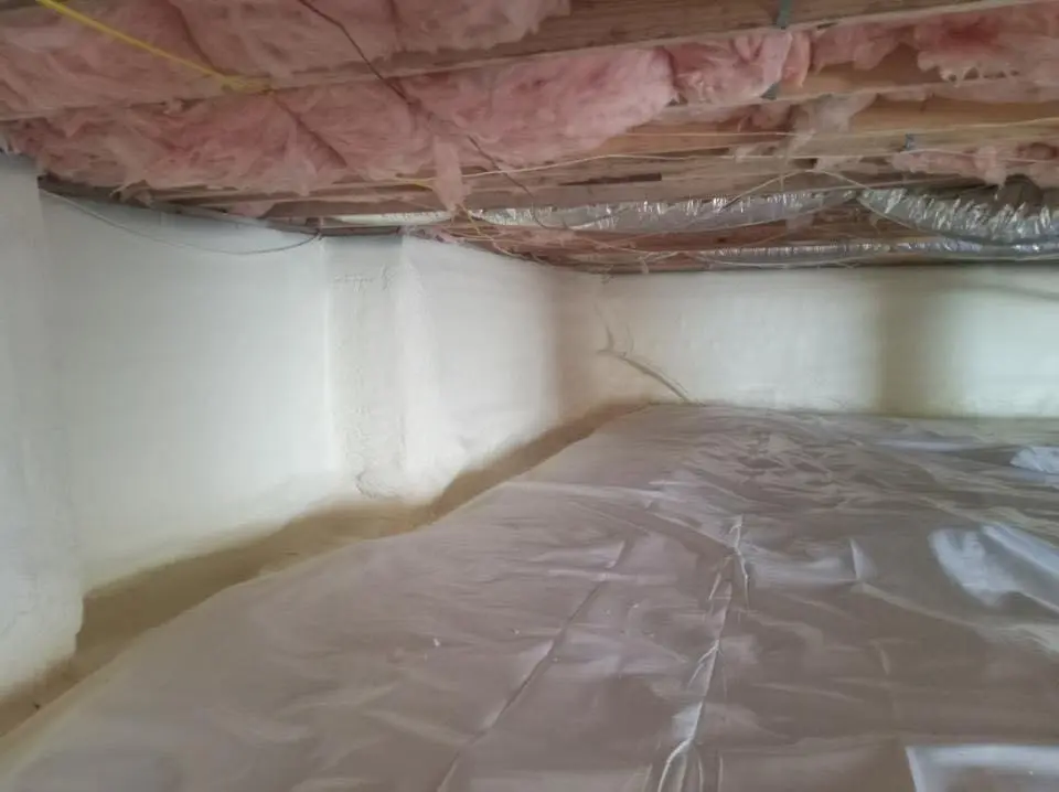 Crawl space encapsulation with closed-cell spray foam for Commercial Roof Restoration in Allen Park